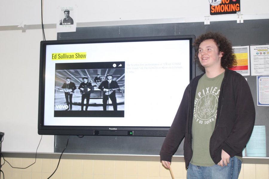 Sean Wolfe presenting his project, Music of the 1960s