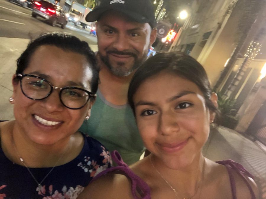 Hilda Vergera-Huertero (left) with her husband, Junior (center), and daughter, Magalie (right)