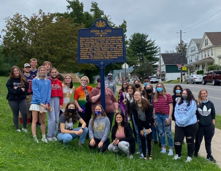 Students visit the John S. Fine historical marker.