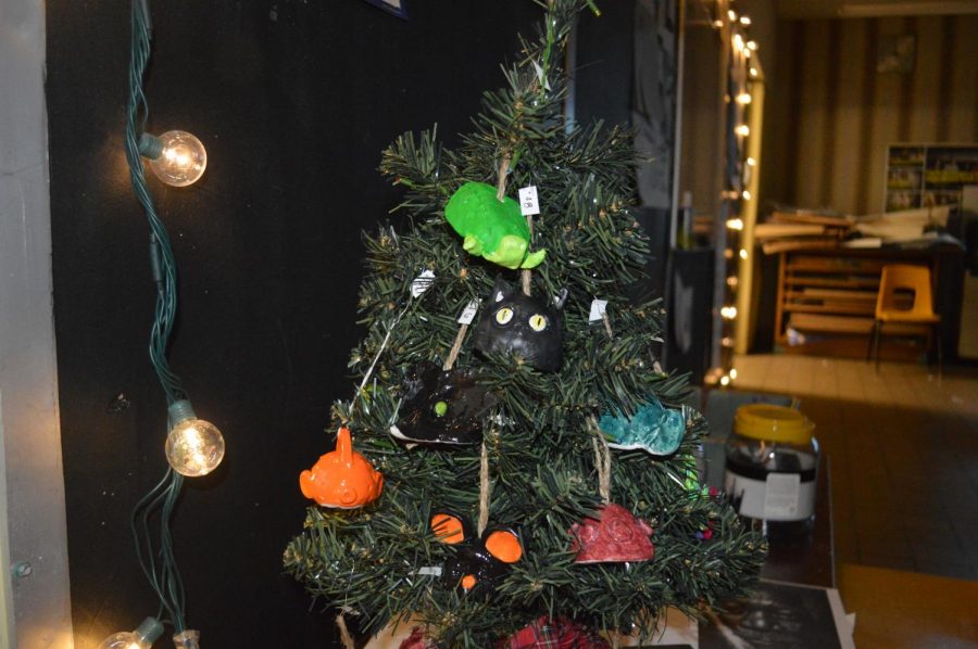 A Christmas tree filled with festive ornaments created by the students.