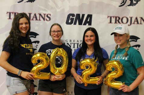 From left to right: Myla Vnuk, Kaleah Moran, Mallory Mayo, and Kayla Krushinski sport their college merchandise. 