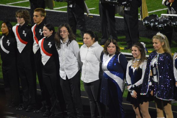 Our GNA marching bands drum majors, Ryan Ortiz and Liz Minnelli, next to our color guard captain, Mariah Minnelli.