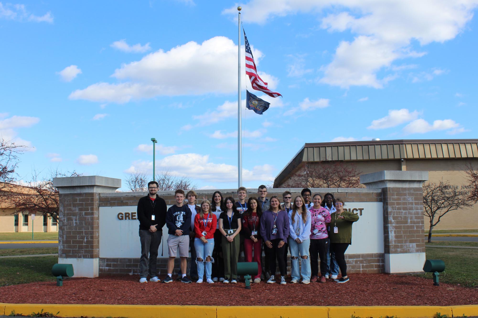 Mrs. Muench's Advanced Placement Government class posed in front of The Greater Nanticoke Area High School sign.